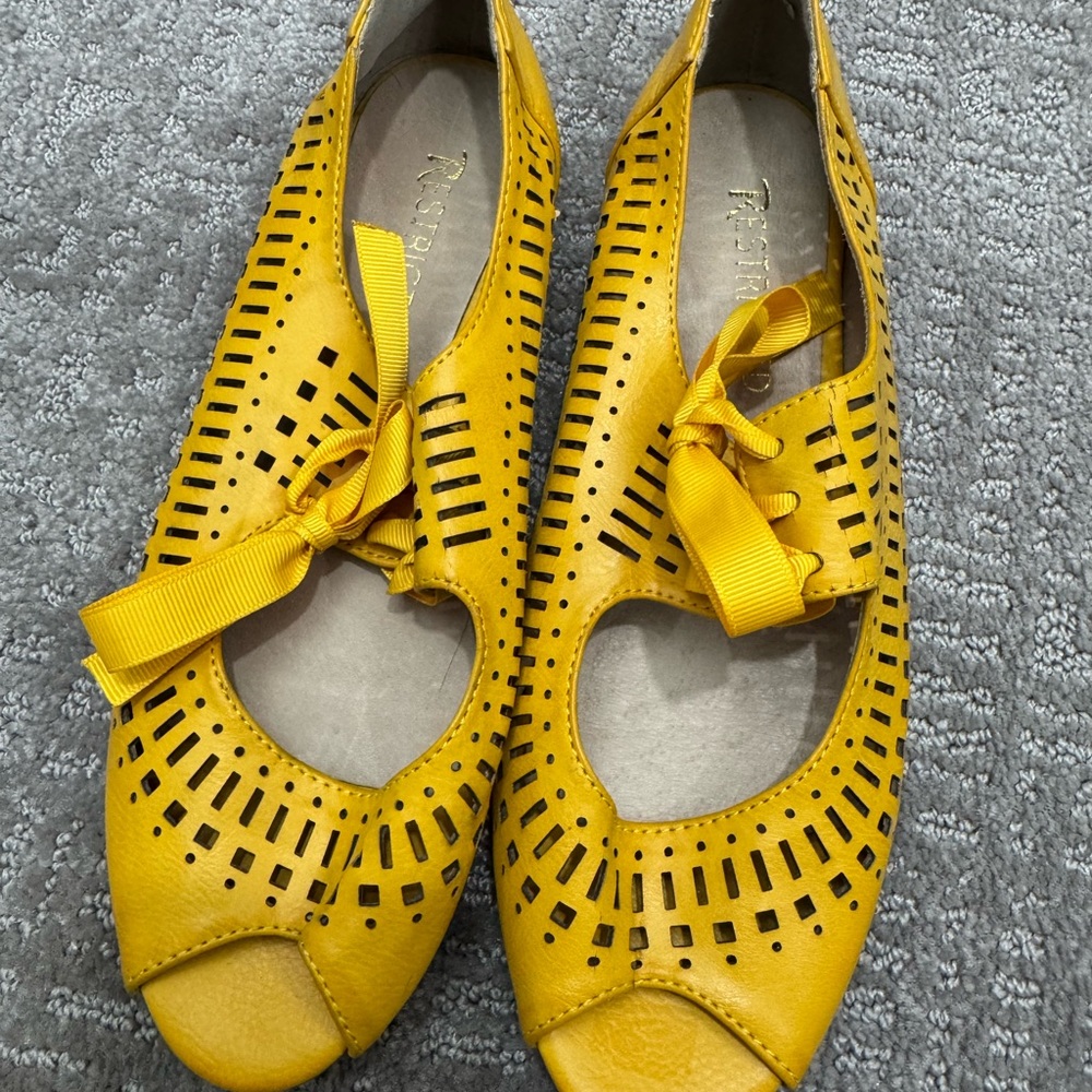 Restricted Yellow Cutout Flats